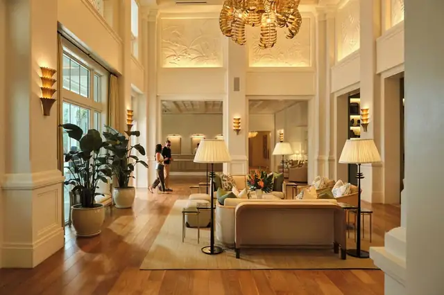 Naples Beach Club in Naples, spacious lobby with high ceiling and large windows