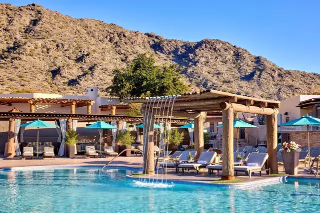 JW Marriott Camelback Inn in Scottsdale, pool area with loungers and umbrellas