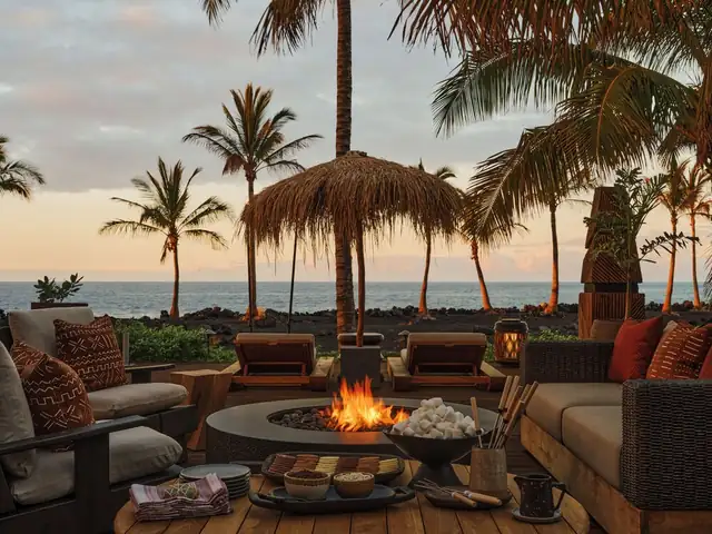 Kona Village on the Big Island, outdoor area with a fire pit and armchairs