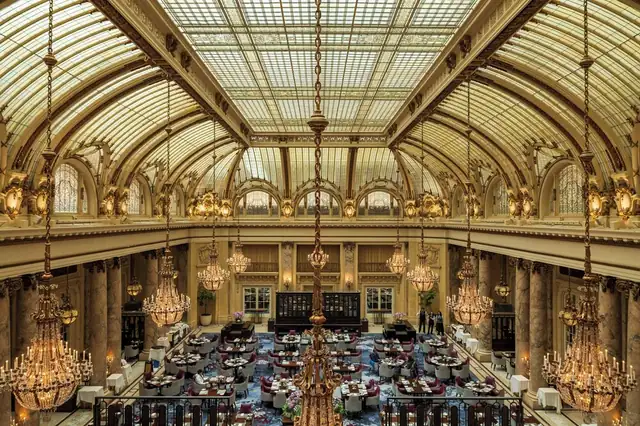 Palace Hotel in San Francisco, grand hall with high arched ceiling and chandeliers