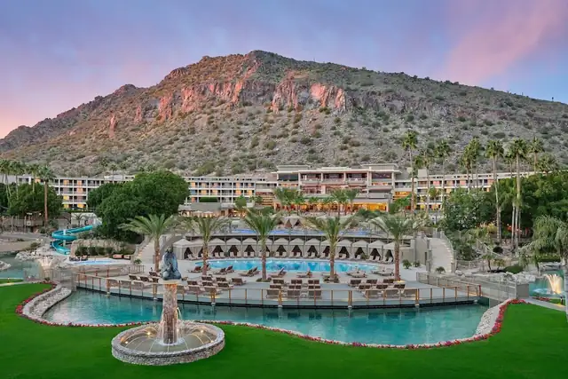 The Phoenician in Scottsdale, resort with a large swimming pool and palm trees